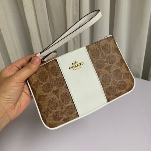 コーチ エコバッグ偽物 花柄 財布 持ちバッグ 一つ折り フェニックス 小銭入れ 革製 レディース ブラウン