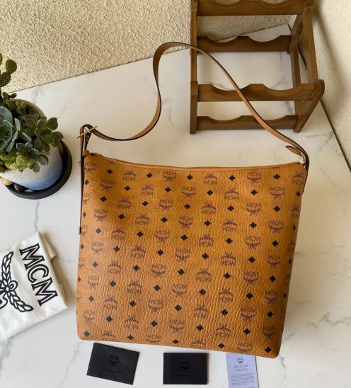mcm バッグ ヤフオク偽物 エムシーエム レザー 通勤 優雅 ハンドバッグ トート 6721 ブラウン