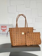優雅レディ mcm バッグ ヤフオクスーパーコピー エムシーエム 牛革 トート ハンドバッグ ブラウン